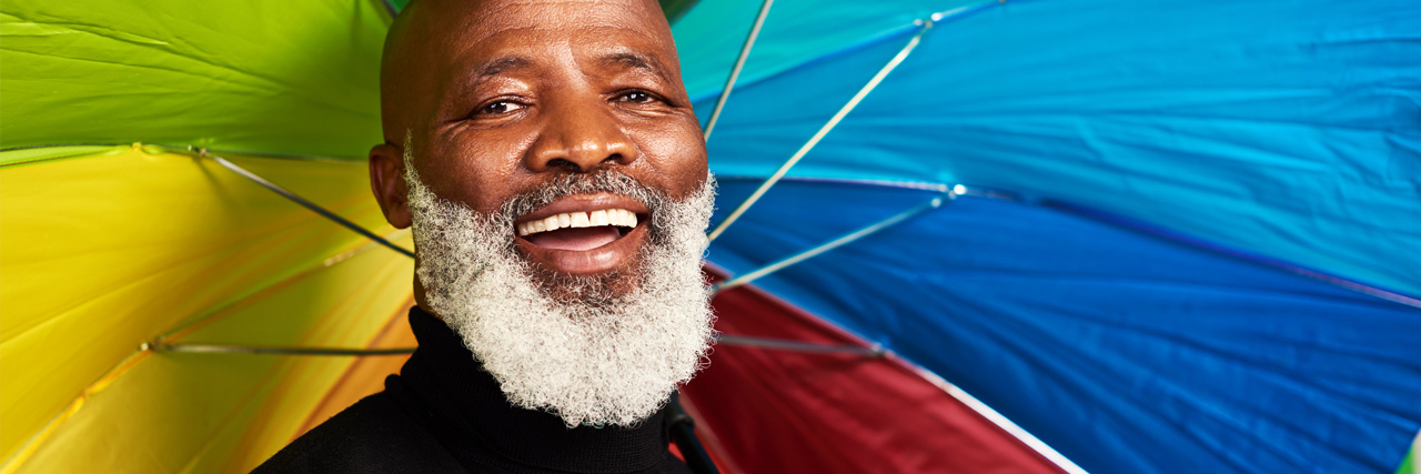 Man holding an umbrella.